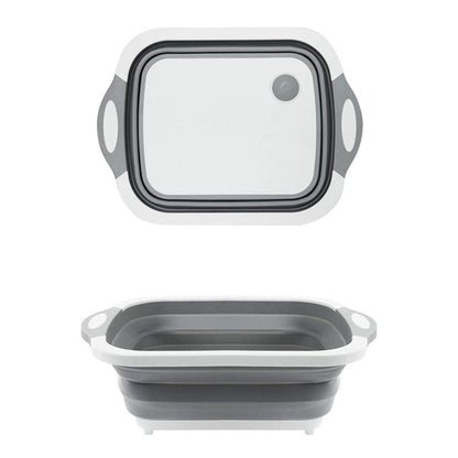 Compact foldable chopping board with dish rack and washing bowl features.