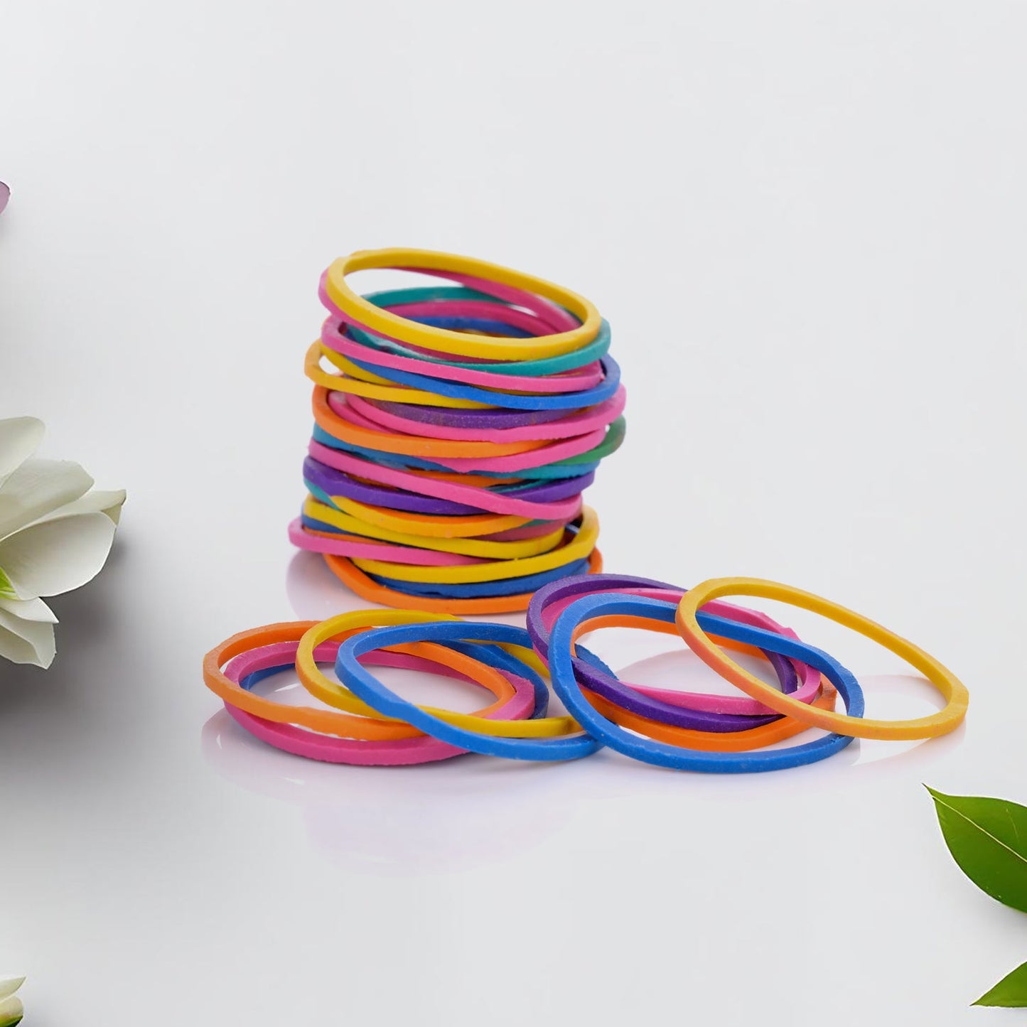 Strong rubber bands keeping computer and headphone cables tidy.