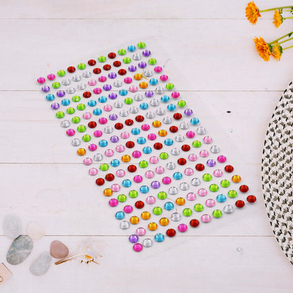 Assorted multi-size shining stone stickers in various colours for creative crafts.