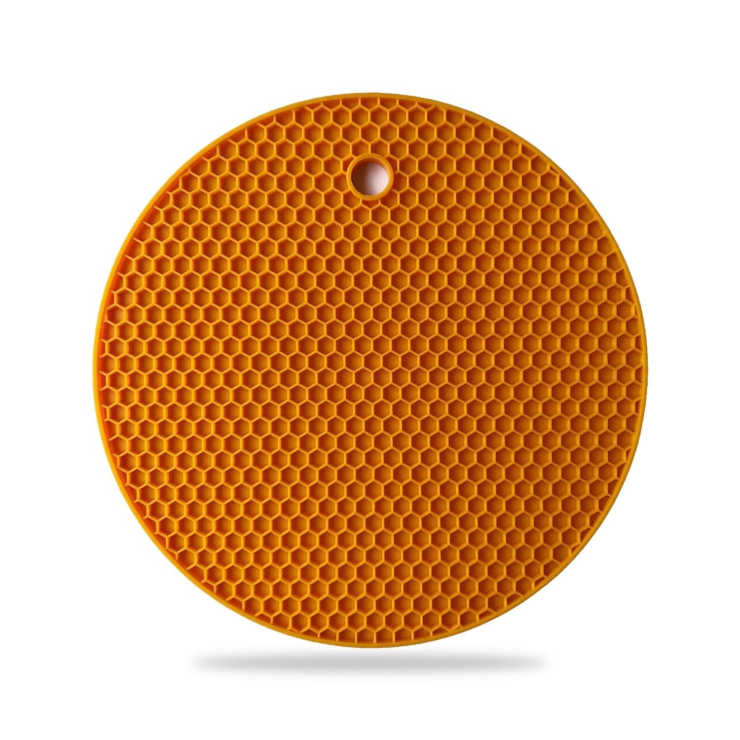 Durable silicone hot mat shown resisting high temperatures from a pan.